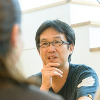 お施主様と談笑する角倉さん